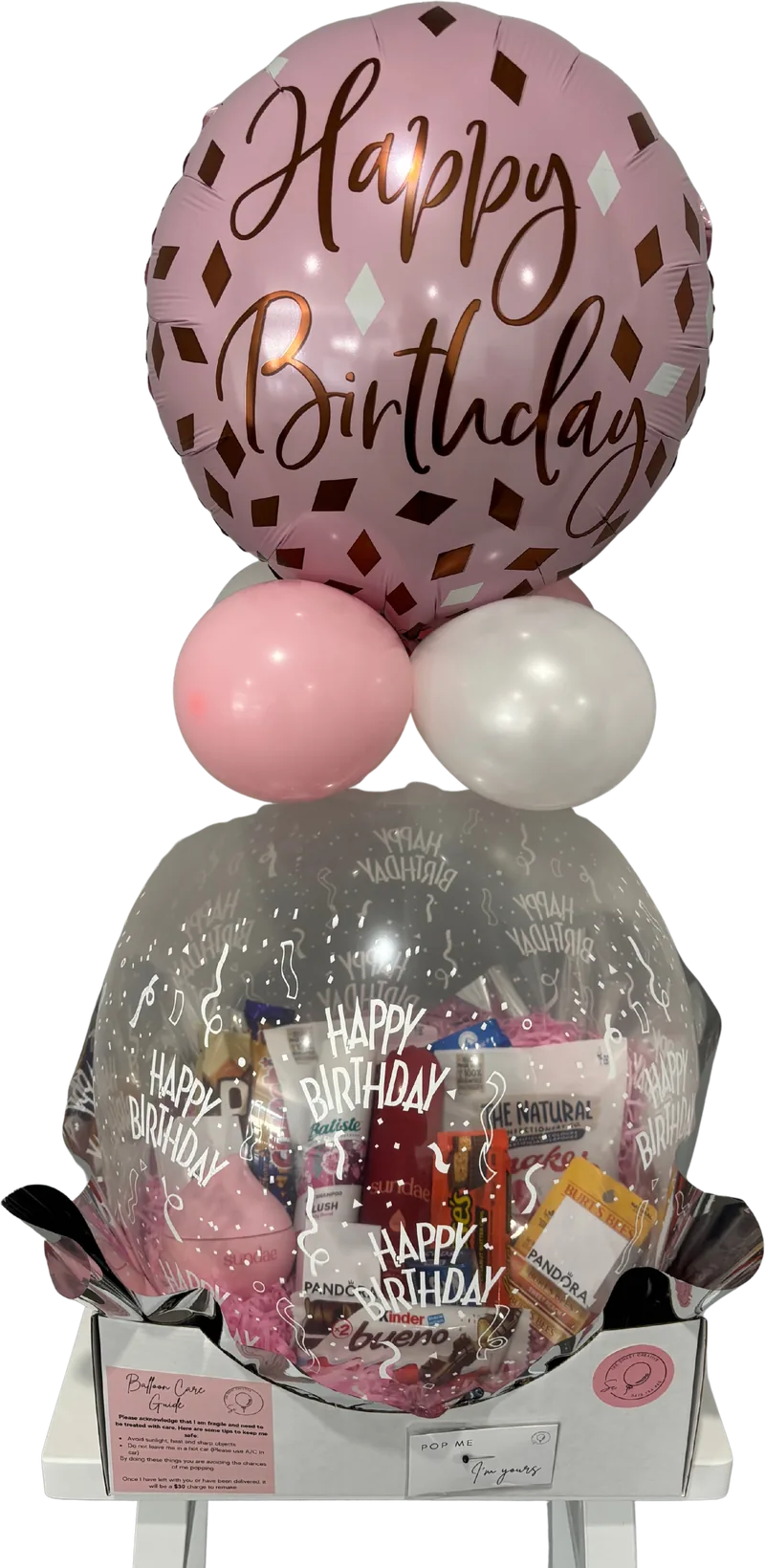 Hand-tied pink birthday gift balloon